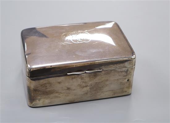 An Edwardian silver cigarette box by A & J Zimmerman, Birmingham, 1905,